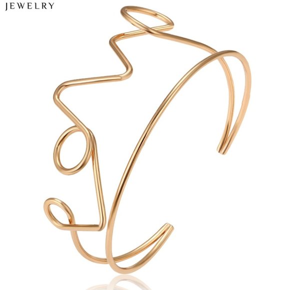 Jewelry - Stunning "LOVE" 18KGP Bangle Bracelet